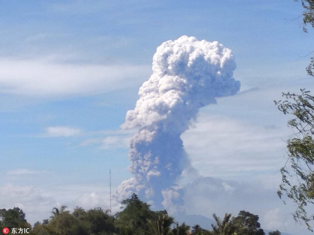 A volcano erupts in Indonesia on the same island as earlier earthquake.  