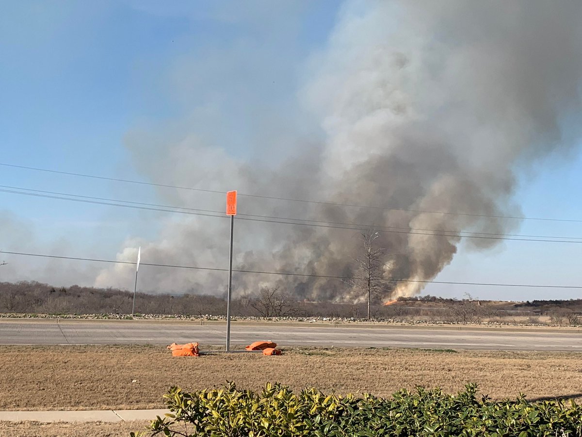 The Colony FD also en route. Here is a photo of the fire happening now north of Highway 121 near the Lake Lewisville dam.