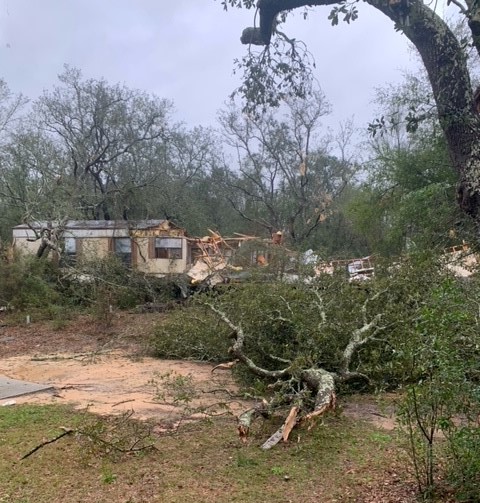 A tree smashed a mobile home in Holt this afternoon during severe storms. Okaloosa County deputies received reports of a possible tornado in the Log Lake Rd