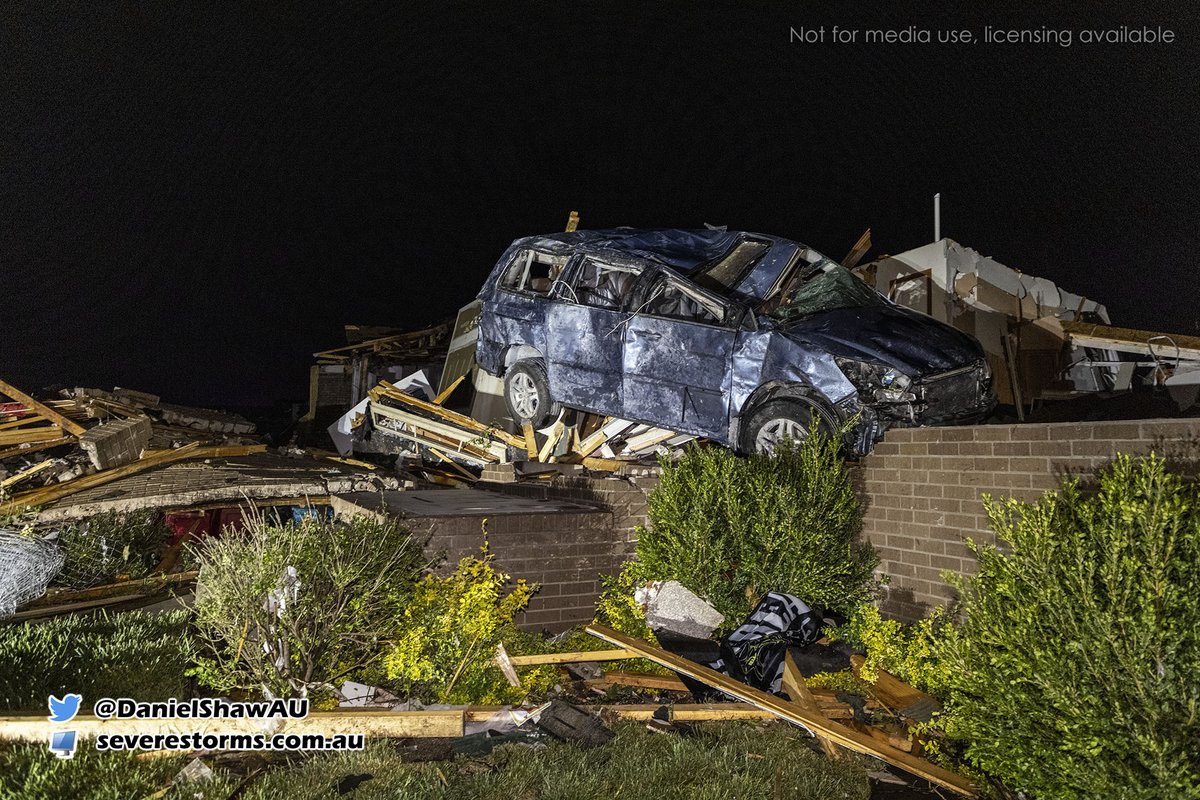 Cars are on top of homes as a tornado swept through Andover Kansas