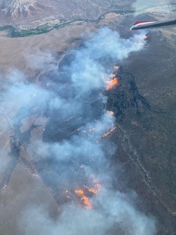 Multiple fire crews are working a massive fire spanding 600-700 acres in Washington County