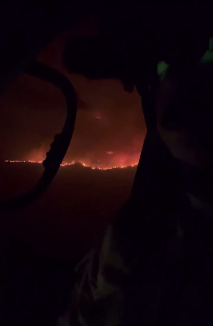 View from inside Fire watch 76 over the FairviewFire. This helicopter specializes in reconnaissance and intelligence as well as coordinating water drops. The crew uses night vision goggles (NVG) as seen in the video