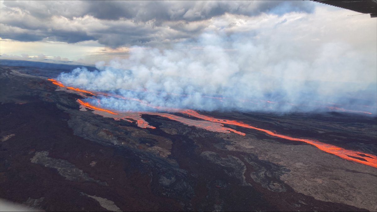 MaunaLoa is erupting from vents on the Northeast Rift zone. Flows are moving downslope to the north. USGS Photos from Civil Air Patrol fight.