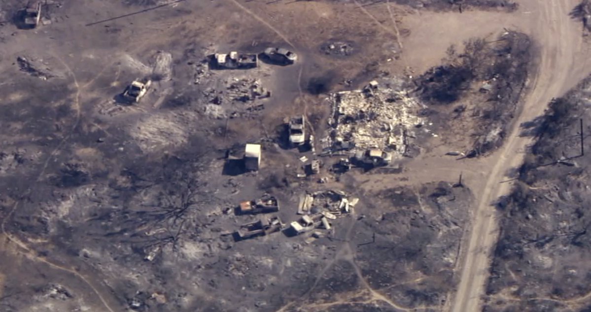 Aerial footage from the San Carlos area this morning shows multiple structures and vehicles burned to the ground. Officials say the fire has doubled in size from estimates yesterday