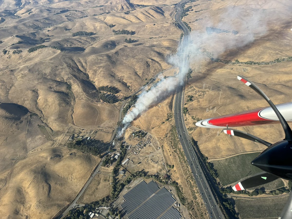 AmericaFire : Forward progress of the fire has been stopped and held at approximately 5 acres. Expect for crews to remain at scene for several more hours securing control lines and mopping up