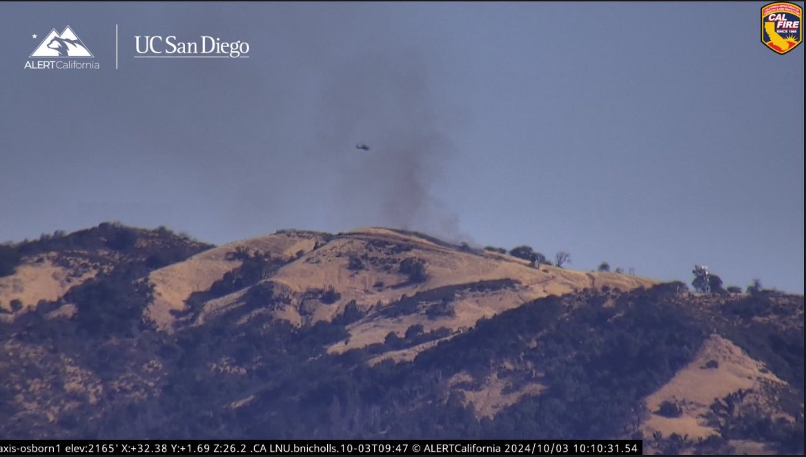 SugarFire : Per Boggs Copter 601 arriving at scene, the fire at the top of Bald Mountain is approximately one acre. It is burning in grass at a slow rate of spread with a light west wind on it