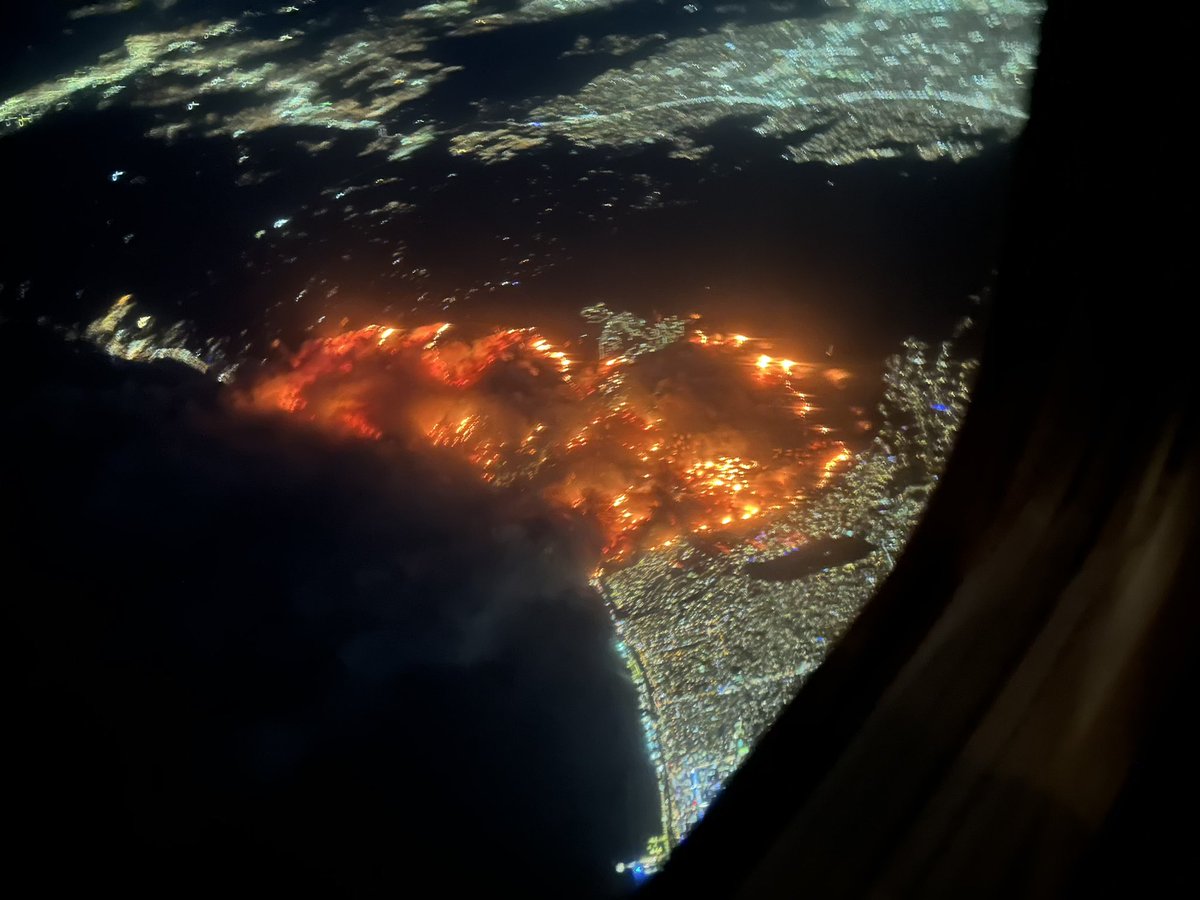 View from the sky above LA.  Pacific Palisades and Malibu engulfed in flames