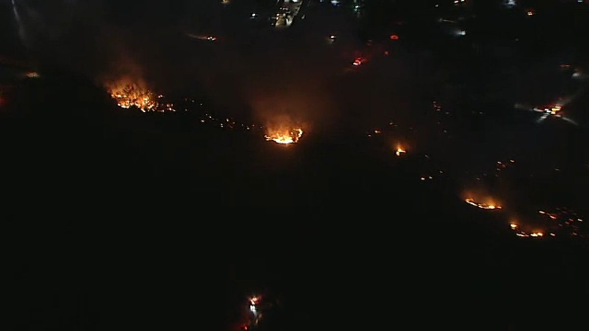 Firefighters are battling a fire in Jurupa Valley that has grown to about 38 acres